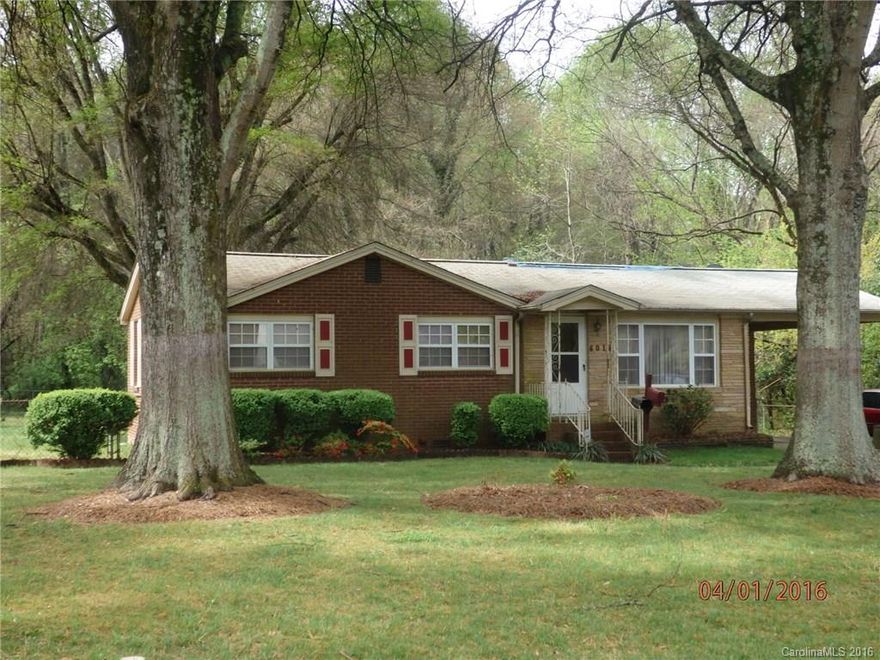 Brick home needing some repair but has lots of potential -   Lots space with living room, 3 bedrooms 1 original bath and another bath added in the den.    Kitchen has been updated in the past.    Oversized den with bar gives lots of possibilities for living space.   As Is.