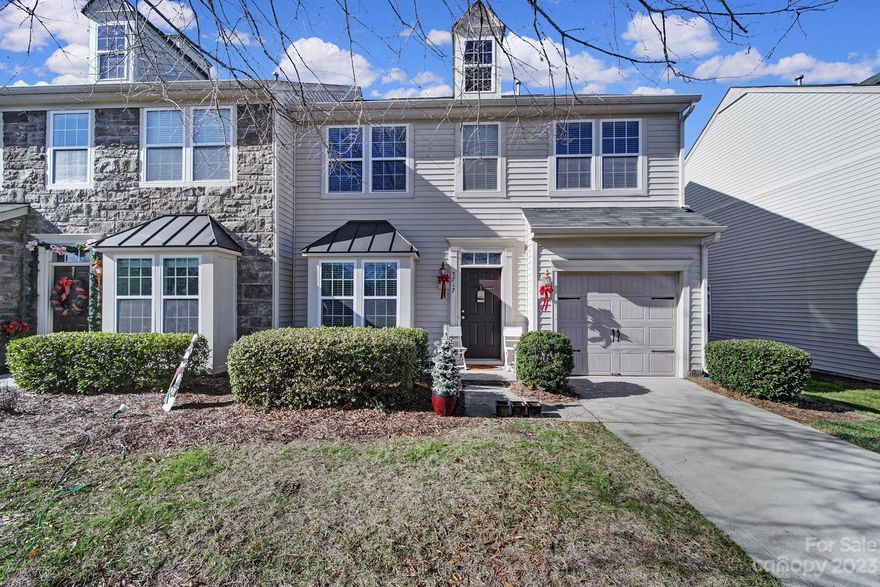 This premium corner unit in the sought-after Berewick subdivision, enjoys a prime location just across from the Manor Clubhouse and community pool. Featuring custom hardwood floors, fireplace, patio, and formal dining area, this townhome comes equipped with all appliances. Spacious master bedroom boasts dual walk-in closets, a dual vanity, garden tub, and a separate shower. Two additional bedrooms offer ample space and come with large closets. The finished garage is complete with a painted floor.

Monthly HOA covers all exterior lawn care and maintenance, trash, recycling, water, and sewer. Access to The Manor Club includes the pool, 24-hour gym, tennis courts, beach volleyball, hiking trails, exercise classes, playground, and various family-friendly neighborhood activities. The location is incredibly convenient to the Charlotte Outlet Mall, shopping centers, restaurants, doctors'/dentist offices. Only 20 minutes from Uptown, 15 minutes from Southpark, and 12 minutes from Ballantyne.