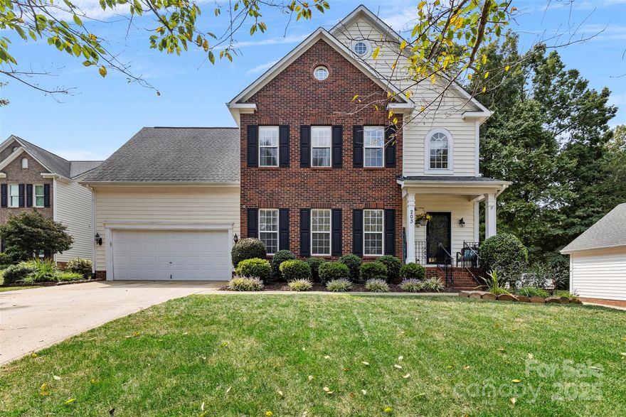 Charming, 4 Bedroom, 2.5 Bath Home with 2 Car Garage (with epoxy floors), located in desirable Lake Access community! Kitchen features granite counters, black stainless steel appliances, island with seating, tons of cabinetry for storage & a Pella sliding door. Hardwood floors in Foyer, Kitchen & Dining Room (also featuring crown molding & wainscoting)! Great Room with gas fireplace & crown molding! Large, main level Laundry Room! Spacious Primary Suite on upper level features tray ceiling, ceiling fan/light, walk in closet & private bath! Primary Bath with separate shower & garden tub! 3 additional, spacious bedrooms on upper level! Large Bonus/Bedroom! Attic storage! Fenced Back Yard with plenty of mature trees for privacy & shade! Harbor Cove features an amazing community pool overlooking Lake Norman. Eddie's on Lake Norman and Havana 33 are Waterfront Restaurants within walking distance. Easy access to I-77 & hospital.