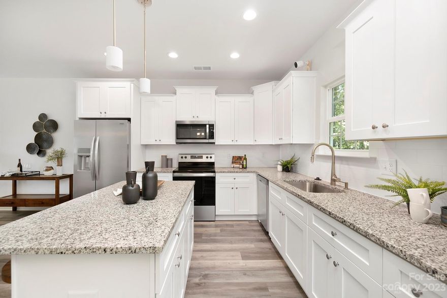 This home qualifies for 100% financing ask for details!  Northway Homes is offering up to $10,000 in buyer credit, use towards closing costs or rate buy down. A must-see new construction by Northway Homes. Enjoy 4 spacious bedrooms and 2.5 elegant baths. The open floor plan features modern finishes and fixtures that create a warm and inviting atmosphere. The luxury vinyl plank flooring in the main living areas and plush carpets in the bedrooms provide comfort and style. The spacious chef's kitchen is designed for entertaining and cooking, featuring a large granite-topped island, stainless steel appliances, and ample cabinet space. The primary suite is a true retreat, with a walk-in closet and ample space to relax and unwind after a long day. The secondary bedrooms are equally impressive, with ample closet space and room for personal touches. Enjoy the spacious and private deck perfect for all your summer gatherings. Don't miss this opportunity to own and create lifelong memories.