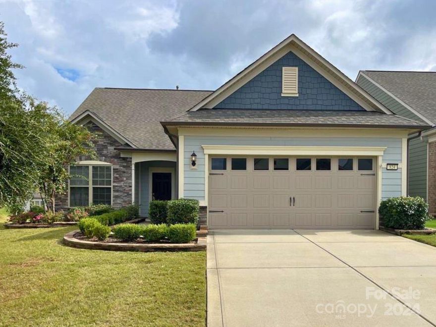 Get ready to be impressed by this meticulously maintained 1.5 story Castle Rock model on a premium lot in Carolina Orchards. This home has a gourmet designer kitchen featuring double wall ovens, 5 burner gas cooktop, soft close drawers/cabinets, pull out drawers, & a walk in pantry. The first floor also includes an office, two bdrms, a gorgeous sunroom, gas FP and a screened in porch! The 2nd story has a large room that can be a flex space or a room for guests. Neutral painted walls, new carpet, 3” laminate floors are just a few of upgrades. Don’t miss the extra added massive walk in storage over the garage in addition to the other standard storage area. The garage has a 4 ft extension for a golf cart.The exterior has been professionally landscaped with paver built beds and irrigation. Carolina Orchards includes an activities director,indoor & outdoor pools, hot tubs, clubhouse, fitness center, ballroom,playground,dog park,pickle ball, tennis & bocce courts, tons of activities & clubs!