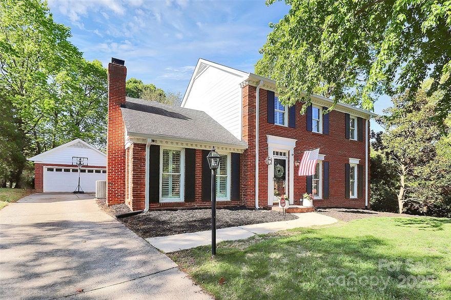 Welcome to this stunning full-brick home on a corner lot in sought-after Sardis Plantation. The beautifully remodeled kitchen showcases a custom range hood, quartz countertops, a farmhouse sink, island with seating, breakfast area, and access to a spacious deck—perfect for entertaining guests. The inviting family room features a gas fireplace, custom wainscoting, and a vaulted ceiling with exposed beams. The secondary bedroom offers a wall of custom built-ins, ideal for extra storage or display. Outside, enjoy a private, fenced backyard complete with a charming playhouse, versatile side yard, and an invisible dog fence for your furry friends. The detached two-car garage includes room for a workout area, workshop, or additional storage. Community amenities include scenic shaded trails, tennis courts, and a playground. Conveniently located near top-rated schools, shopping, dining, parks, and all that Matthews and South Charlotte have to offer—this home truly has it all!