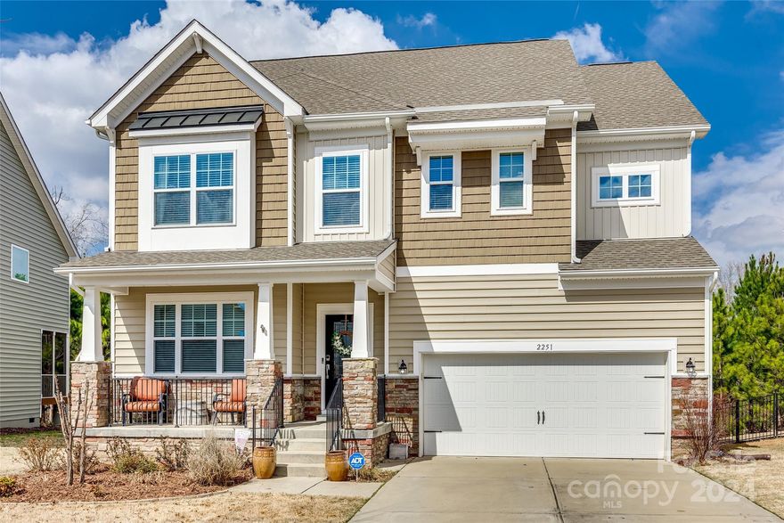 Beautiful 4 bed, 3.5 bath, roughly 2900 sq ft home in one of Fort Mill's most desired neighborhoods, Waterside at the Catawba. As you walk through the front door you are greeted w/ a custom ship lapped entryway, giving it great character. The large dining room has been converted into an office space w/ custom built in French doors, new LPV flooring throughout, beautiful gourmet kitchen w/ newly updated quartz countertops, new backsplash, stainless steel appliances, new kitchen hardware & new light fixtures. Freshly painted built-ins in the living room making this open concept main floor feeling fresh. Upstairs you'll find all 4 bedrooms, 3 full bathrooms, a loft - perfect for a playroom, laundry room w/ a new countertop & cabinets for storage. Spacious owner's suite w/ large master bath, garden tub, double vanity & his & hers custom closets. Enjoy the outside w/ a screened in porch, a large deck & stamped patio. Not to mention all the amazing amenities this neighborhood has to offer!