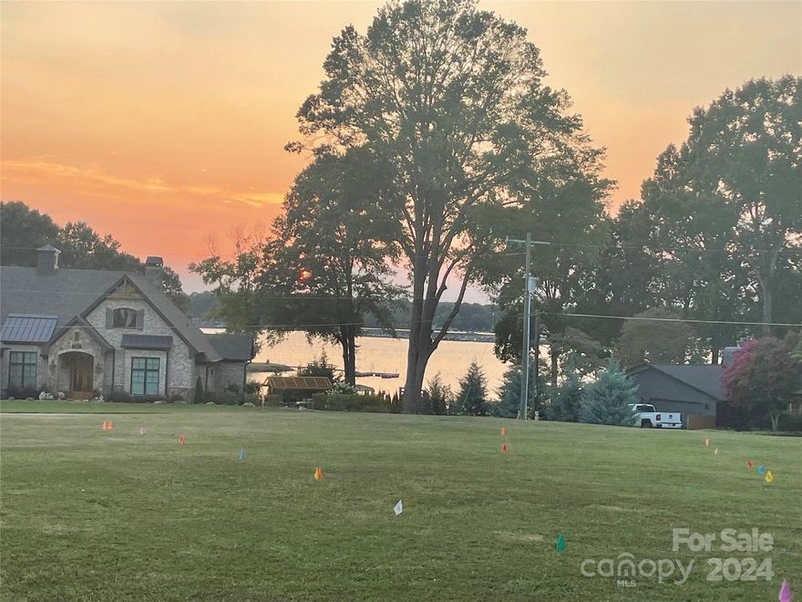 Amazing One Of a Kind lot with Stunning Views! Water views in multiple directions!  Exceptional Location close to I77 yet, country feel. Lot is nicely tucked in Peninsula. No time limit to build, bring your own builder. Survey has recently been completed and lot has been perc'd by a soil scientist. This lot is surrounded by multi-million dollar homes! Lot can be purchased by itself or there is two adjoining lots you can purchase with this one!