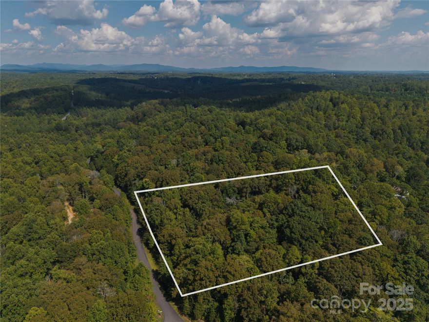 Perched on a peaceful ridge with stunning near-360° views, this 3.35-acre parcel is your chance to build a
dream home. Enjoy quiet mountain living in a natural setting, surrounded by trees and sky. A perfect place
to unplug and create your own haven.
Located in a private mountain subdivision just outside Rutherfordton, this property offers paved road
access on two sides and community amenities including a clubhouse, bathrooms, and a kids' area. Power
is believed available at the road; water and sewer likely require well and septic (public options may be
nearby). The land is sloped but buildable, just 3–4 miles from groceries and close to Lake Lure and
Chimney Rock.
If you’ve been dreaming of land to call your own, don’t wait because this mountain gem could be the one.
Contact us today to explore the possibilities.
**Seller financing is available!**