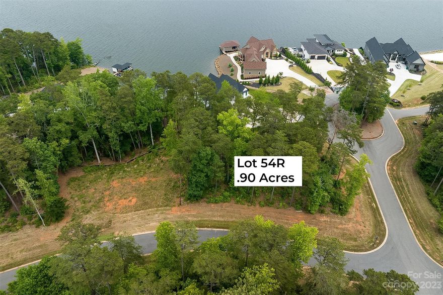 This unique waterfront lot has a beautiful view of the main channel and is located in one of the most gorgeous subdivisions on Lake Tillery. Custom house plans drawn specifically for this lot will be included. This lot has 65 feet of shoreline, and as such, does not qualify for a boathouse, but the views are amazing. Take advantage of the ability to access the lake directly from your own lot to go swimming or launch your canoe, paddleboard or kayak. Convenient to the community boat ramp and waterfront park!