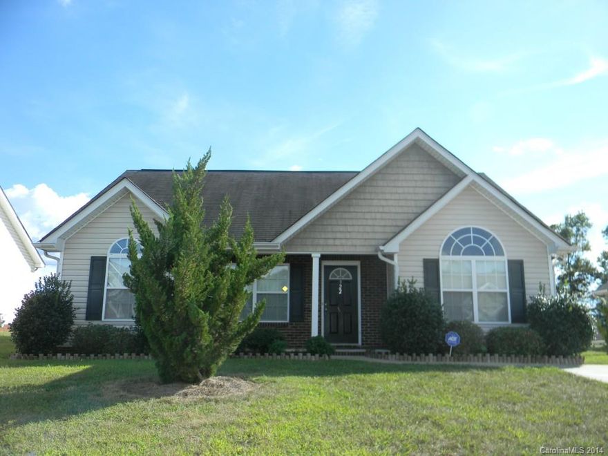 Charming 3BR/2BA - fresh paint, tile floors throughout, covered & extended patio, fenced yard & storage building! Neat & clean. Large laundry room. Gas log fireplace. Move in ready. Sold as is.