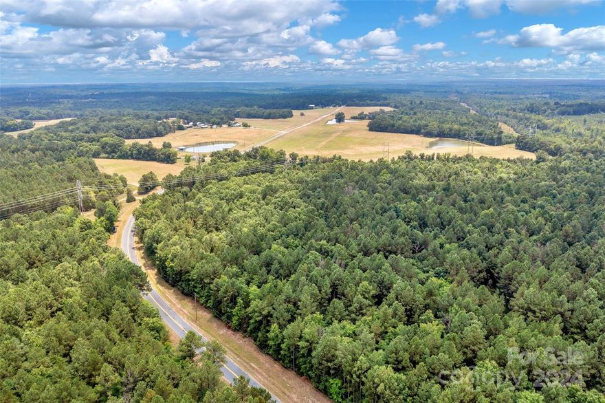 Beautiful private lot for sale in the highly desirable Richburg, SC. This tranquil 14 acres of land is waiting for your custom 'forever' home. If you are looking for a peaceful homestead tucked back in the woods, this is the place for you! Conveniently located in Chester County; this property is 10 minutes away from I-77 & HWY 9, 40 Min South of Charlotte, Very close to Fort Mill, Rock Hill, and York. Close access to the Catawba River and the local lakes. There is 1300' of road frontage, electrical utilities, Fiber Optic Internet available!! The uses of this land are endless; Pursue building your dream home, use for agricultural purposes, micro-farming, recreational activities, and definitely hunting. Abundance of wildlife and nature throughout; create a beautiful homestead in a rural country setting yet very close to modern amenities. This sale is subject to a completed survey. ***More land available for sale***. Contact listing agent for more info.