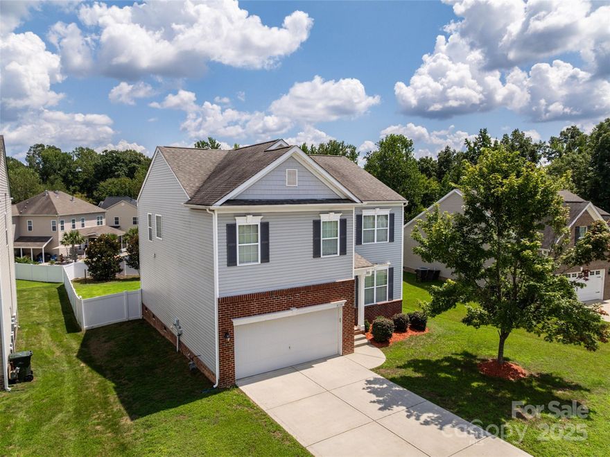 Motivated sellers are ready to work with buyers and are open to contributing toward closing costs or even helping buy down your interest rate with acceptable terms. Located in the desirable Norwood Ridge community, this 4 bedroom, 2.5 bath home offers the perfect blend of comfort, space, and convenience just minutes from I-77, Ebenezer Park, shopping, and dining in Rock Hill. The open-concept main level features warm hardwood floors and an inviting layout that flows effortlessly for everyday living and entertaining. The kitchen shines with granite countertops, stainless steel appliances, and generous cabinet space. Upstairs, a spacious loft provides flexible living options ideal for a playroom, home office, or cozy second living area, while the bedrooms offer walk-in closets and storage throughout. The garage is already outfitted with built-ins for easy organization, and the fenced backyard offers plenty of room to relax, play, or host friends. As an added bonus, a brand-new community pool is scheduled to open just in time for summer 2026. This is a fantastic opportunity to get into a great neighborhood with space to grow!