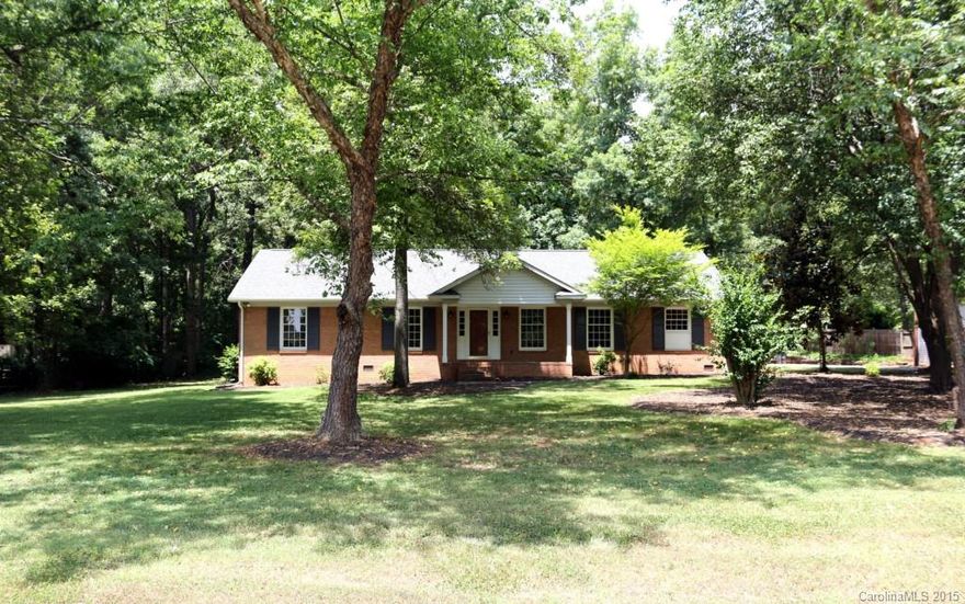 This gorgeous ranch on approx 1 acre will blow you away !  The attention to detail on this complete remodel sets it apart.  This all brick home features a beautiful updated kitchen with granite counters and ss steel appliances.  Bathrooms have also been completely updated with granite counters, tile floors, and fantastic tile work in the showers.  Great for commuting-near I-485.