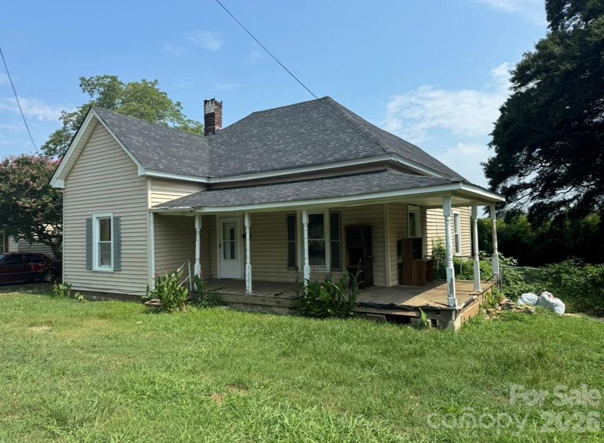 Investment property with considerable potential. Brand new 30 year architectural shingle roof.