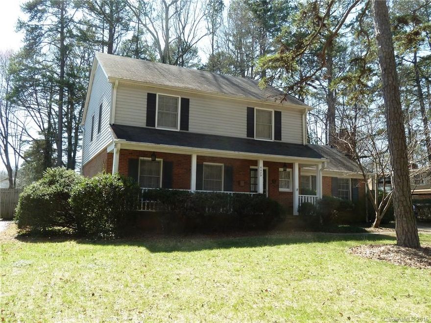 4 Bedroom, 2 1/2 bath home convenient to downtown!  Masonry fireplace in cozy den, formal dining and living room, eat-in-kitchen, gleaming hardwood floors upstairs, carpet recently cleaned and updated full bathrooms.  Enjoy patio in park like setting with plenty of trees and privacy!  Wired storage building and quiet street.