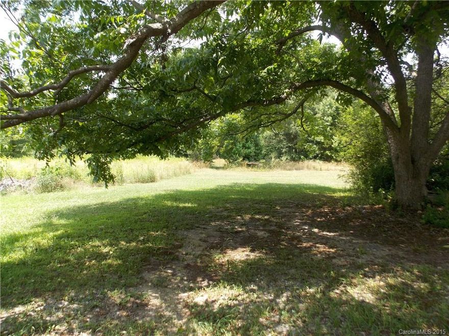 Bring your builder! Beautiful parcel off Charlotte Highway. Country living yet close to Lake Wylie, Historic Brattonsville, Downtown York and Rock Hill. Only 30-45 minutes to Charlotte, NC. Located next to Olde York Farms and The Pines at Campbells Crossing. At one time there was an area cleared, but since has grown up but minimal work to open back up. Red building in front is NOT part of this property.