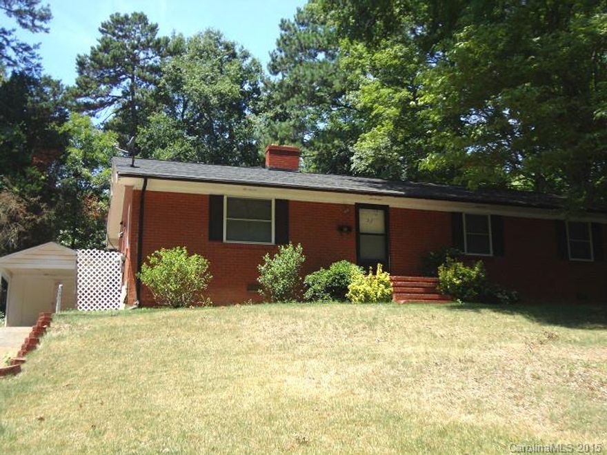 MOVE-IN READY brick RANCH in the heart of Downtown Mooresville! Large Living Room with hardwoods, Dining area off Kitchen has Fireplace, open Kitchen with Washer/Dryer connections, 2 Bedrooms share hall Full Bath and Master Bedroom with hardwoods and Full Bath. Enjoy a private backyard, 1-Car Carport and convenient location to Downtown and I-77. Tenant will be responsible for all utilities and lawn maintenance. No Smoking and Pets are negotiable with a non-refundable pet fee.