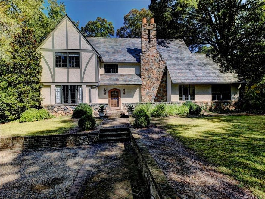 Charming Myers Park home on large, flat lot.  High Ceilings.  Heavy moldings.  Whole house remodeled in 2007. Living Room with french doors opening to private backyard. Kitchen with Subzero/Wolfe Range, Stainless/Granite countertops, large island, open to great room w/fireplace. Butlers pantry. Breakfast Banquette. Office.Laundry.Mud Room.  Master suite has sitting room large bath and walk in closet.   Guest house with kitchenette, living room and bedroom/bath.  Perfect yard for a pool!