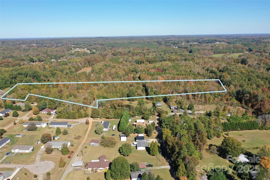 Discover this rare opportunity to own 10 to 35 acres of scenic land in Rockwell, North Carolina. Tucked away just off Highway 152 on Vera Drive, this property offers the perfect balance of privacy and convenience. Located only 10 minutes from Interstate 85, residents can easily reach Concord, Charlotte (49 minutes), or Greensboro (1 hour) for work, shopping, or entertainment.
The property’s RA zoning allows flexibility for various uses — from custom-built homes and family compounds to small-scale agricultural or equestrian pursuits. Multiple school options are available nearby, including charter and highly rated public schools, making this an ideal location for those seeking space and quality of life.
Enjoy the quiet, rural setting while staying close to dining, recreation, and community amenities. Whether you’re looking to build your dream home on 10 acres or invest in the full 35-acre tract, this property offers outstanding potential in a growing area of Rowan County. Seller financing available with acceptable terms.