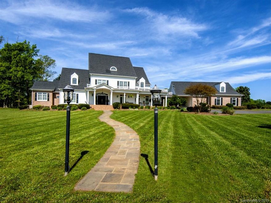 This immaculate plantation style home sits on 23+/- acres, features 6 bedrooms, 4 full baths and 2 half baths, gourmet kitchen with sunny breakfast room.  Open and spacious floor plan with formal dining, living, and great room. Perfect for entertaining! Detached 3+ car garage with apartment above with full kitchen, bedroom. Barn with concrete floor, tack & feed rooms, loft.  Additional 77+/- acres for sale with fencing, crossfence and lucious grass grass and more grass...... See MLS #3082428