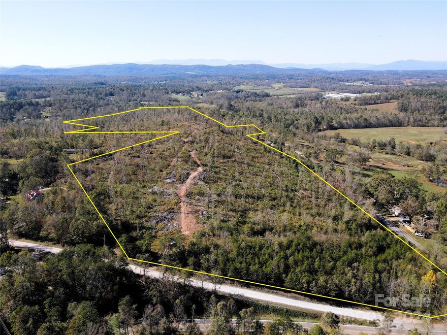 Discover endless possibilities with this versatile 72-acre property! With road frontage on US HWY 64, NC HWY 226, Fortune Rd, and Bill Deck Rd, this land is perfectly positioned for a variety of development options whether you’re envisioning retail, industrial, residential, or a sound land investment. The property is not zoned however McDowell County will have to review and approve any development plans. The land is strategically centered between Morganton, Rutherfordton, and Marion. Recently timbered, the property features convenient logging roads throughout, making it easy to explore on foot. This expansive, flexible tract offers a rare opportunity for those looking to invest, develop, or simply own a piece of prime land with great potential. Bring your vision and transform this space into something extraordinary!