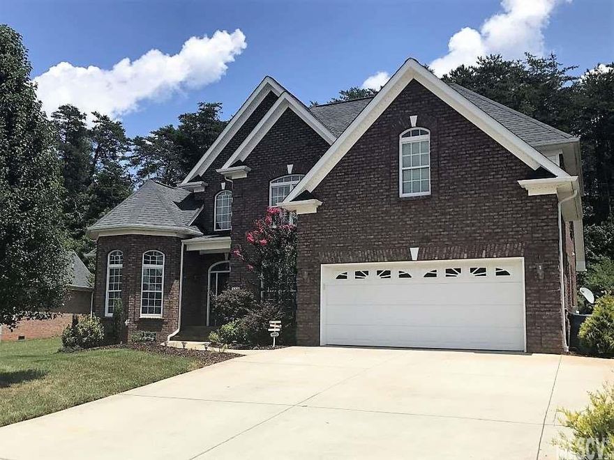 Beautiful Custom Home in Wittenburg Springs-Custom work throughout--Spacious, open floor plan with high ceilings & beautiful archways. Large kitchen with custom cabinetry, center island, granite counter-tops, pantry, & a sunny breakfast nook. Hardwood floors & 9' Ceilings through-out main level (tile in laundry & baths). Master suite offers a double tray ceiling, sitting area (with bay window), his & her walk-in closets, PLUS a luxurious master bath--his/her vanities, tiled/walk-in shower, jetted tub & vaulted ceiling. Open den/family room with a gas log fireplace & access to patio on back of home...great for entertaining. Laundry room with work sink + an additional BR on the main floor. Upper level--a large bonus room (or 5th BR), the 4th bedroom has a walk-in closet & separate floored attic access (great for storage), the full bath includes dual sink vanity.