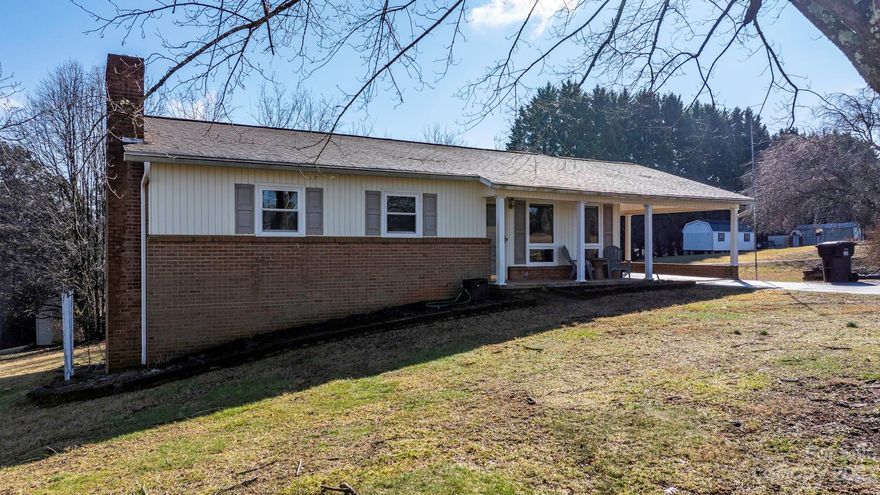 Traditional Brick Ranch home with an excellent floor plan a carport and a full basement on a quiet dead end street. This is a great one floor easy living home. Step into the front door to a large living room. Behind the living room is a kitchen and dining area. Down the hall are three nice sized bedrooms and a full bathroom. Take the steps down to a full basement that is perfect for storage or expansion. Outside you can enjoy a near level front yard and a gently rolling back yard with a storage building. This home is on a dead end street  but only minutes to I-40. The home appears to have a newer roof and the hvac looks recently replaced however the owner recently inherited the home and has no knowledge of the home. There is some flooring that may not qualify for government backed financing. T settle a potential encroachment form the neighbor a survey as performed and a small section of land was conveyed. The attached survey is the correct description.