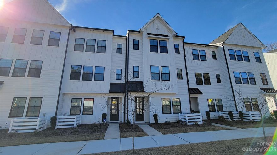 Welcome to your dream home! This townhome combines custom finishes with casual living for a perfect blend of convenience and luxury. The extended gourmet kitchen with gas cooktops is a culinary delight, flowing seamlessly into the open-concept second floor for entertaining.

The upgraded primary suite offers luxury with a tray ceiling, tile shower, dual vanities, and custom cabinetry. Convenience is key with a main-level entrance, 2-car garage, and spare parking for guests. The main level has a perfectly situated bonus room with the ability to be multifunctional. 

Additional features include a built-in Tesla charger, Electrolux washer/dryer, refrigerator and a 19 ft. patio deck for relaxation. This listing is a synthesis of elegance and comfort. Just minutes from Park Road shopping center and South Blvd, this townhome is a fabulous opportunity.