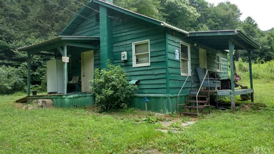 Private - Small home in rural area, stream and lots of wildlife on property. Small pond across road from home is included. This is an Estate being "Sold As Is" Only 4 miles to Blue Ridge Parkway and 7 miles to Boone/Blowing Rock area