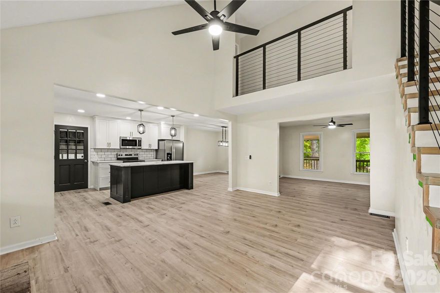 This home is a rare find with acreage and beautiful trees give privacy while in the back, the land opens up. This 3 bedroom, 3 full bath with a bonus/office space home gives that farmhouse meets modern living experience with master and second bedroom on the main level. Brand new appliances, lots of storage space with a large 2 car garage, shop and shed in the back. This home is perfect to sit on either of the spacious porches and also has a sunroom. This property allows rural living while having shopping and restaurants just a few miles away.