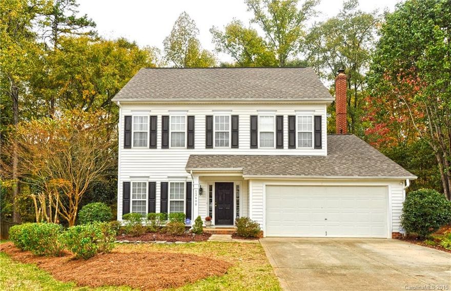 Desirable Cardinal Woods-all the perks of Ballantyne living w/low Pineville taxes! Meticulously maintained home, orig owner, features tray ceilings, heavy moldings, fresh paint & new Tigerwood hardwood floors up/down. Formal living & dining; upgraded kitchen w/granite & stainless appliances open to family room. Secluded entertaining on blue slate patio overlooking private wooded yard - coveted lot in the neighborhood.New HVAC 2014, roof 2011. Don't miss this immaculate home - it won't last long!