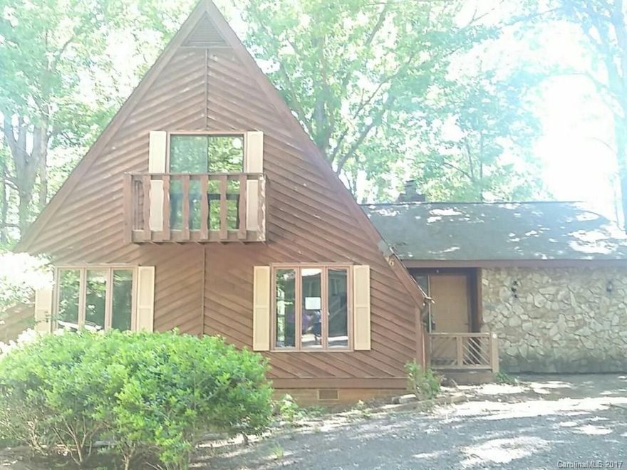 Nice A Frame home with tons of potential! Nestled down a shared driveway, this home offers seasonal waterview! Great floor plan with master on main, 1 bed/1 bath & roomy loft upstairs. Plumbing to upstairs bath and HVAC work have been completed.