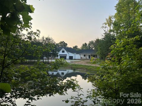 Photo of 9015 & 9019 Fisher Road, Rockwell, NC 28138 (MLS # 4397684)