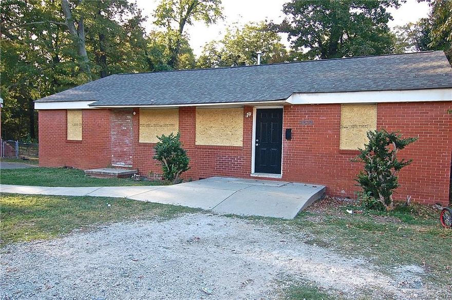 This converted Duplex provides ample opportunity!  Huge Cash flow potential in this 4 bedroom 2 bath home.  Basic duplex floor plan remains intact giving you two huge living spaces with multiple renovation options.  Imagine a huge Eat-in Kitchen adjacent to a generous living space and/or take two bedrooms to make a huge Master suite.  There's plenty of space to make it work!!  **Note: BUYER must confirm intended use with Municipality, former duplex now single Family.