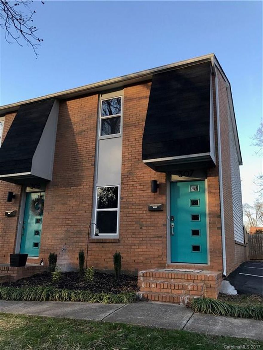 Beautiful end unit townhouse offers a modern, updated interior with gorgeous flooring throughout. No carpet.  Overlooks Five Points Park w/ walking trails/ basketball court/ tennis courts/ playground. Closets/ pantry have solid wood built-ins/shelves. Gorgeous kitchen w/ island/ tile backsplash/ granite countertops/ SS appliances. Stylish  lights and ceiling fans.  Refrigerator/washer/dryer included.  Convenient to JCSU, Uptown, and future trolley system. Seller providing 1 year Home Warranty.