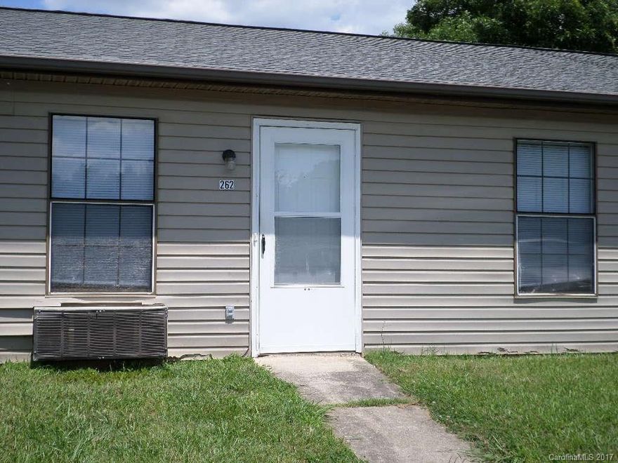 Cute 2 bedroom, 1 bath in the heart of Troutman. Nice open layout with tile flooring throughout the unit. Comes with stove, refrigerator and dishwasher. Wall AC/heat unit. Includes a utility room off back patio with washer/dryer connections. Lawn care is included. Conveniently walk to downtown Troutman's shops and restaurants.