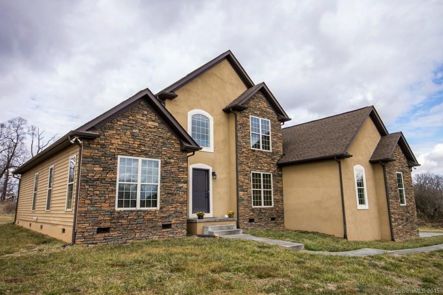 Gorgeous country craftsman home sits on over 3 acres offering plenty of space inside & out.  The open floor plan features a two story foyer & great room.  Large formal dining & breakfast area provide multiple places to dine. Main floor master has walk in closet & luxurious bath.  The office off the foyer is complete w/ closet & doubles as a spare bedroom.  Upstairs 2 spacious bedrooms share full bath. Beautiful granite counter tops, hardwood floors, & attractive paint colors welcome you home!