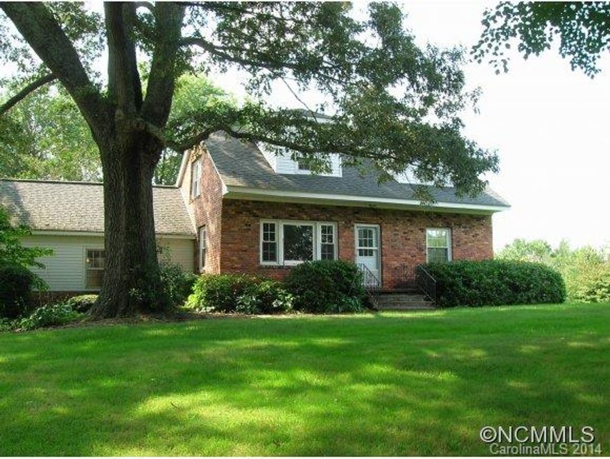 Country living at it's best! A 1903 beauty in an area of fine homes that is renovated for today's living. Modern natural gas heat, new central AC, gas cooktop, new dishwasher & refrigerator, replacement windows and architectural shingles. Connection to city water possible. Huge trees and mountain views provide a serene setting for the good life.