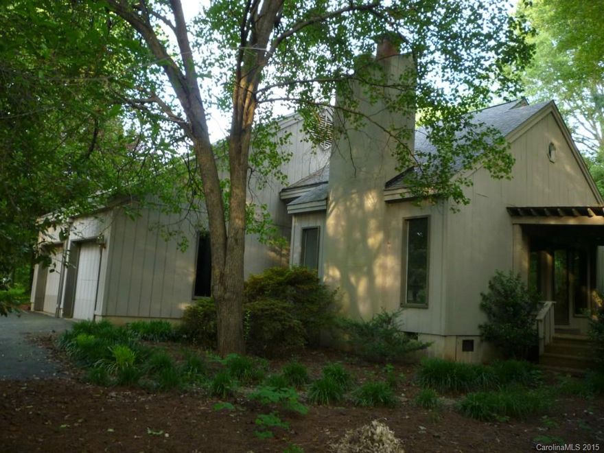 Located in the gated resort style community of River Hills this one is ready to move in or renovate.  Built on a very private lot on one of the prettiest streets in the neighborhood. Enjoy vacation style living year around.