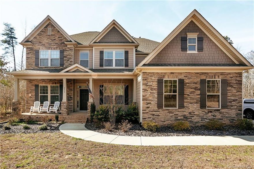 Stunning home with many architectural details & great living space. Foyer is flanked by formal dining & living rooms. Kitchen has working island, SS apps., granite countertops, opens to the 2-story great room with coffered ceiling & includes pass-thru to dining room. Breakfast room accesses the screen porch. 1st floor en-suite bedroom is great for guests or playroom. Luxurious master has separate vanities, soaking tub, shower & large walk-in closet. Three additional bedrooms up. Nice level yard.