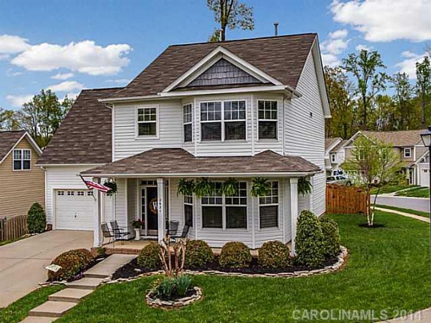 From this home's welcoming covered porch to the fenced yard, this house delivers all the amenities.  Large eat-in kitchen, formal dining, a great room with elegant marble surround gas log fireplace, spacious master bath with large vanity & dual sinks, soaking tub, separate shower.  Good size secondary bedrooms plus bonus family room. Brand new carpet just installed upstairs (May 2014). Community has pool & playground.  Owner is offering home warranty.