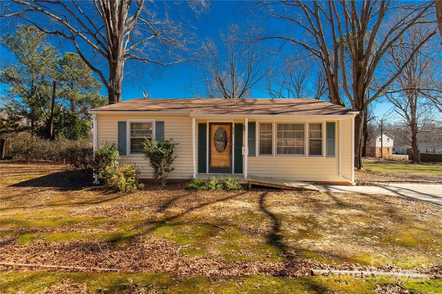 Great location for a home with so much potential. Hardwood flooring under carpet, just ready to be exposed in front den. Large great room in back could be converted into a primary suite if desired. Large wired shop in back. All appliances and furniture included.