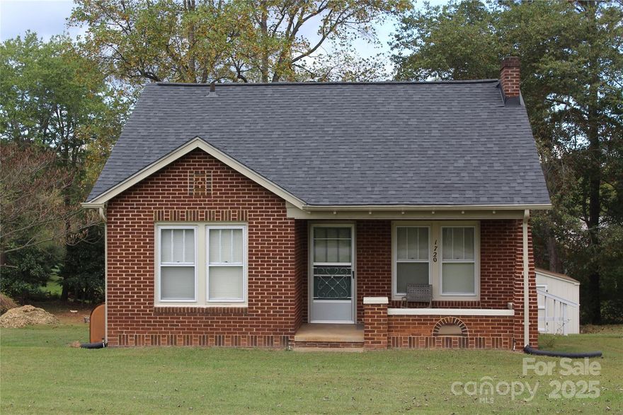 Come check out this charming brick cottage-style home just outside the city limits of Drexel! You will love living in this home. This well-maintained home features two bedrooms and a bathroom on a half-acre lot! On a corner lot.  New laminate flooring and interior painted throughout! Screened-in porch perfect for your morning coffee or enjoying the outdoors! An unfinished basement provides ample storage, and a 12x16 shed in the backyard holds all your lawn maintenance tools.