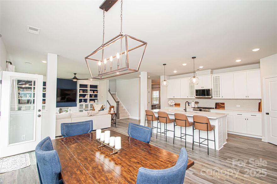 MOTIVATED SELLER!!!  Offering $7,000 toward buyer's closing cost or to buy down rate.  Beautiful, "better than new" home in sought-after Ansley Park! This stunning 3-bedroom, 2.5-bath home also features a dedicated office, versatile flex room, drop zone, and an upstairs loft that can be easily converted to a 4th bedroom.  The open floor plan includes a spacious kitchen with a large island, quartz countertops, stainless steel appliances, gas stove, tile backsplash, and custom pantry shelving. The large primary suite includes a luxurious bath and large walk-in closet. Enjoy outdoor living in the flat, manicured backyard with a fire pit—perfect for entertaining. The home is ideally situated across from the community pool and park. House is built by renowned builder David Weekly Homes. Very energy efficient with HERS rating of 61. Additional highlights include a charming front porch with stonework, top-rated schools, and proximity to shopping, dining, and entertainment. Don’t miss this move-in ready gem in one of the area’s most desirable neighborhoods! Top rated schools! Must see!