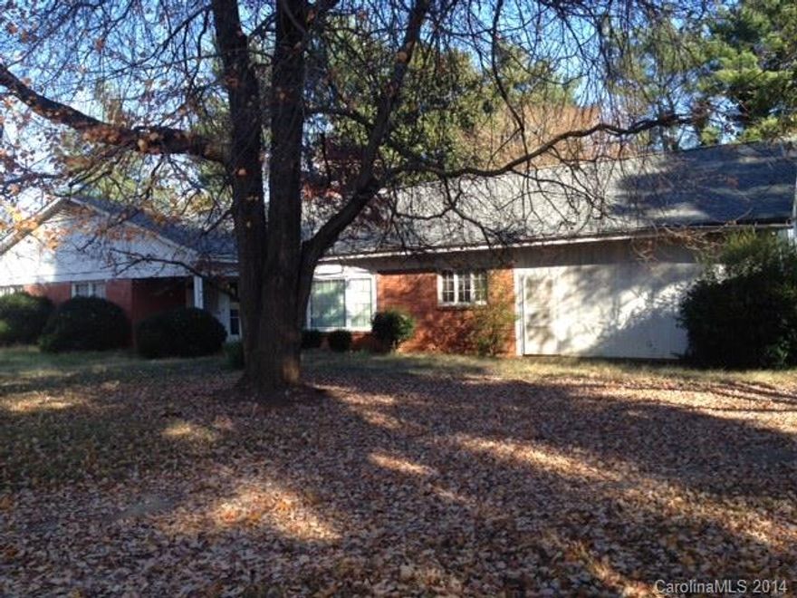 GREAT OPPORTUNITY FOR INVESTORS!!  Fixer-upper located in close proximity to downtown Statesville and I-77.  This home offers 3 bedrooms, 2 baths, a large living room with fireplace, spacious bedroom and a 2 car carport.  The home needs updating.  BRING OFFERS!!