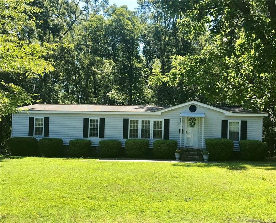 Clover Schools-Great deal on this 3 bedroom, 2 bath home on .5 acre. Formal Dining Room,Needs a little TLC. In city limits but at the end of the road, wooded and private. Home is being sold AS IS. Will need to be a cash or conventional loan.