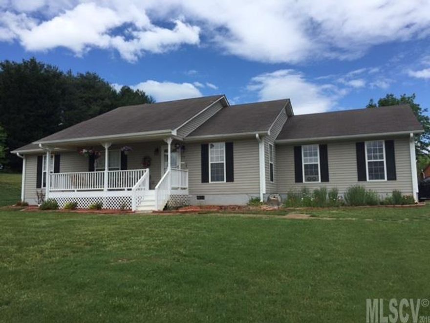 Aaahh...  Life in the slow lane!  Enjoy the relaxation of living life in the county...  This ranch home located in the "Rolling Hills" near Taylorsville  has an open floor plan, an extra room to be used as an office area for mom and dad, or a playroom for the toddlers.  There's a large laundry room on the main level, three bedrooms, two baths, and a double car garage.  Recently replaced are the range, dishwasher, and microwave.  New roof in 2016.  For the handy man, escape to the large out-building, 12 x 28, completely insulated and presently being used as a workshop and extra storage.  Enjoy cool evenings on the deck, or rocking on the front porch in the peacefulness of the country.   There's still time to plant your garden on this 2-plus acre lot if you hurry???  The house is on public water, but there are also 2 wells available.  This property won't last long ... Come see ...  Move in ... and Enjoy!!!