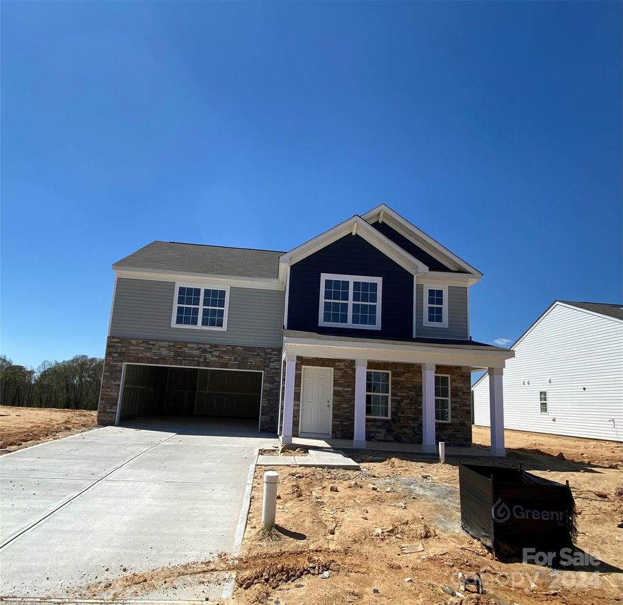 The Bishop Plan offers open concept living with plenty of enough space for entertaining. The well appointed kitchen comes with a dishwasher, GAS range, microwave, a tile backsplash, quartz countertops, and an island that is perrfect for gathering. Cleaning will be a breeze with extensive vinyl plank flooring on the main level of the home and bathrooms. The Owners bedroom is located on the 2nd floor of the home and offers a very spacious walk in closet. The Owner's bath has dual vanities with Venetian marble countertops and a large shower. There is a loft on the 2nd floor that is perfect for hanging out, crafting, or a home office! Enjoy leisure time on your beautiful front porch with your favorite beverage! Walkers Mill is located only minutes from Interstate 77 in Chester County just south of Rock Hill, SC. Don't miss out on early bird pricing!