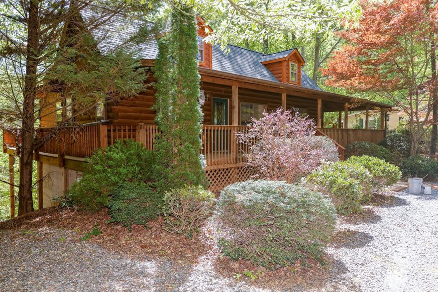 LAKE LURE LOG CABIN...........Immaculately kept 2 bedroom, 3 bath, log home within walking distance to Lake Lure beach and local restaurants. This cozy cabin comes fully furnished and has a full basement, ideal for  game room and additional sleeping area. A rare find at $419,500!