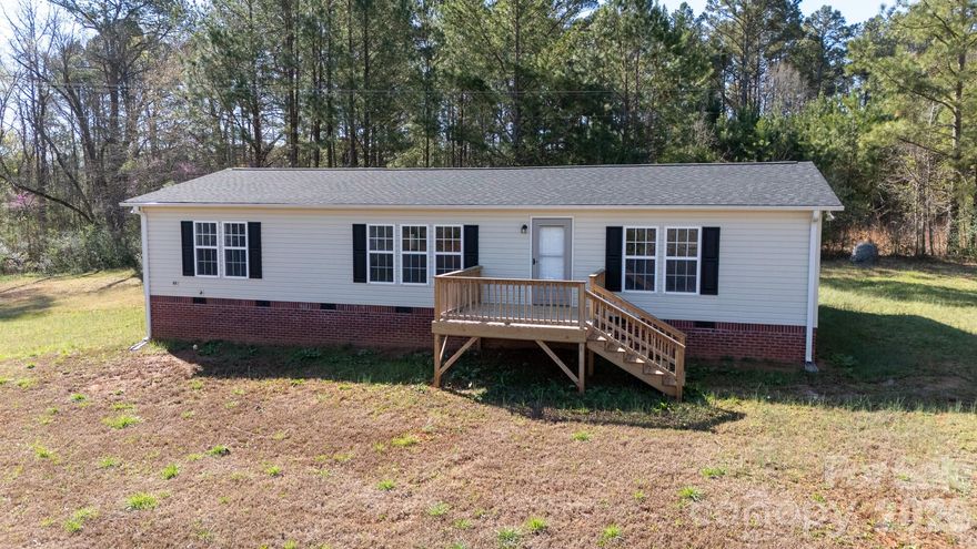 Newly renovated 1996 Crestline Doublewide located on 1.49 acres on a private drive.  Featuring front and back decks overlooking quite, tranquil spaces.  3 Bedroom, 2 Bath split floor plan with larger kitchen area.  New well and septic installed.
