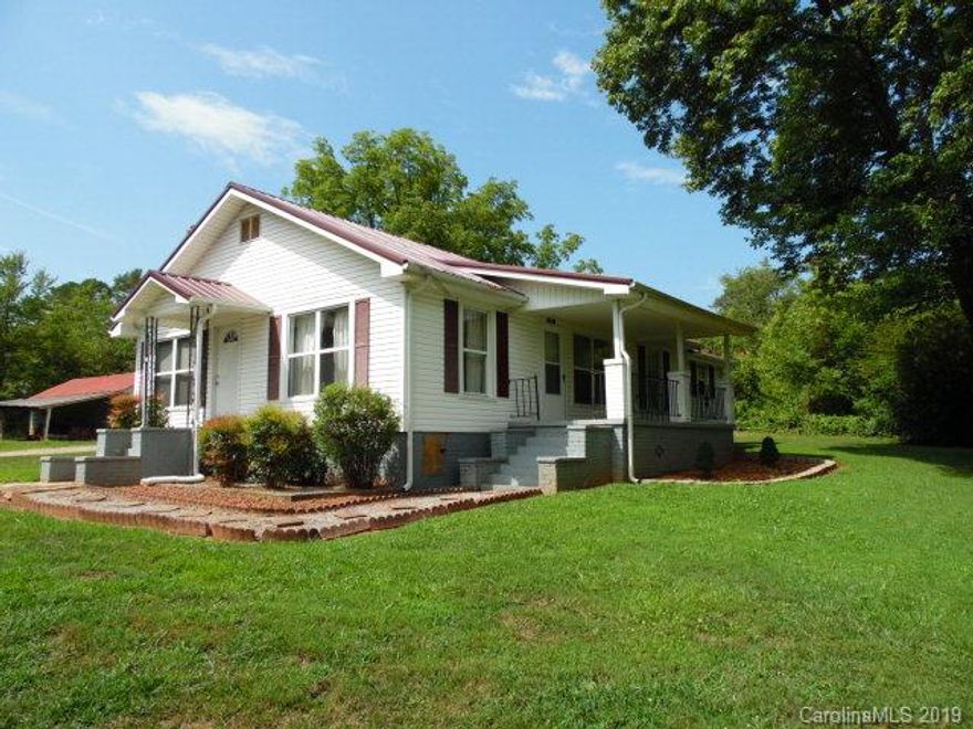 Nice well maintained home with improvements since within last several years to include new metal roof and heat pump, remodeled bathroom & kitchen, refinished original hardwood floors, new flooring.  This property offers a double size lot with 2 outbuildings.  All this on one level with a nice covered porch to enjoy grilling out.  Very convenient to I-40.  Call today for your private showing.