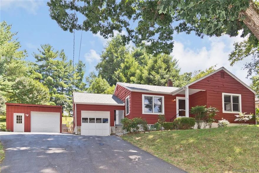 Great location: walk to Kenilworth Lake or drive downtown in 1 min! Home sits beautifully above road on gentle lot with private back patio, garden area, partially fenced yard & both attached & detached garages. Solid pine paneling & solid wood doors/trim through most of house plus bright, easily accessible addition.  All one-level living - no steps! Seller updated via double-pane windows, natural gas furnace, a/c, remodeled kitchen, bathrooms & brand new roof! Detached shop perfect for hobbiest!