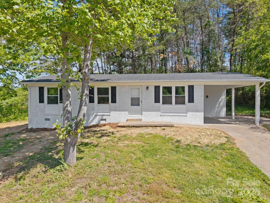 Welcome to 1106 Browning View Road — a beautifully refreshed 3-bedroom, 1-bath ranch-style home offering 984 square feet of comfortable living. This single-story home features major system upgrades including a new roof, updated plumbing throughout, and a replaced septic tank and distribution box. Inside, enjoy fresh interior and exterior paint, low-maintenance vinyl and ceramic flooring, and a stylishly updated bathroom. The kitchen boasts new stainless steel appliances, and a brand-new A/C system ensures year-round comfort. Nestled near a scenic blueberry farm and local winery, this home is close to Lake James, state parks, and all the amenities of Morganton. Perfect for first-time buyers, investors, or those looking to downsize, this move-in ready home offers the ideal blend of modern comfort and mountain charm.